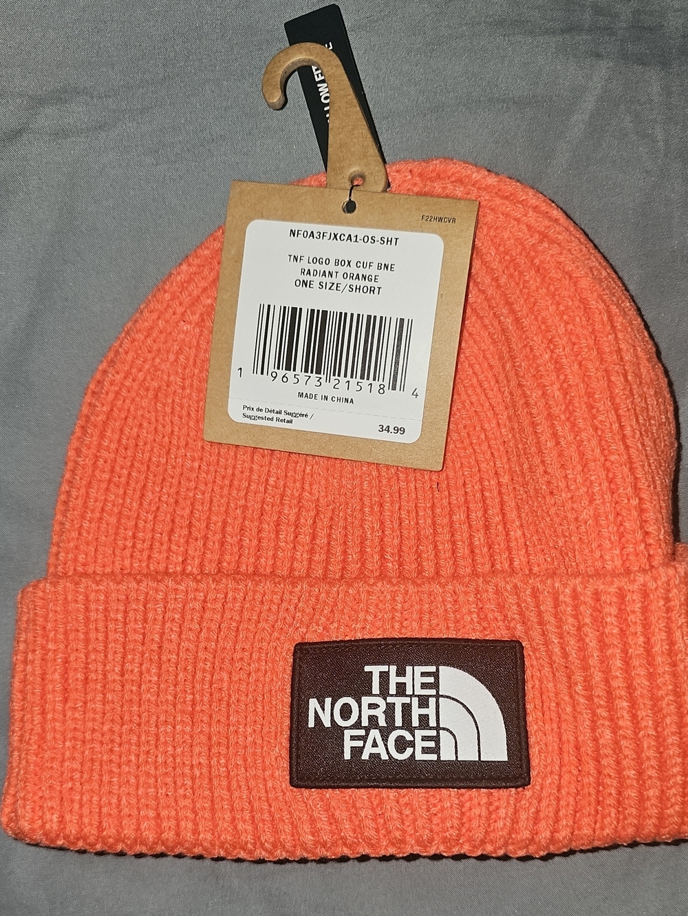 The North Face Orange Ribbed Cuff Beanie with Logo Patch